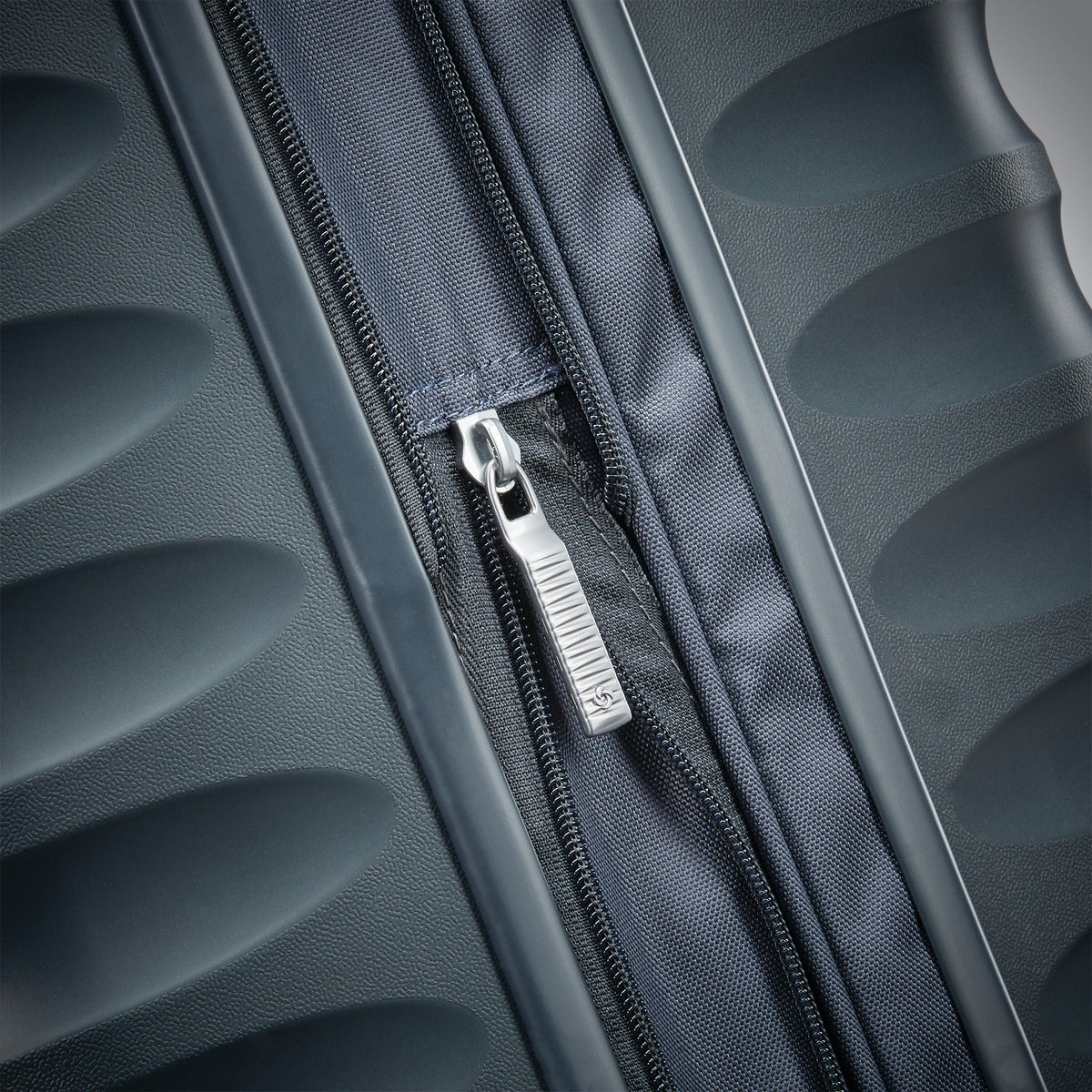 Samsonite Voltage DLX Spinner Large in the color Dark Graphite.