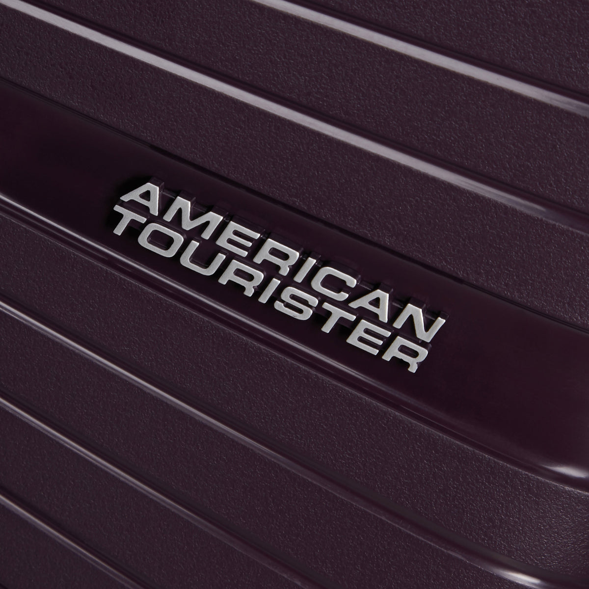 American Tourister Airconic Spinner Carry-On™ in the color Dark Plum.