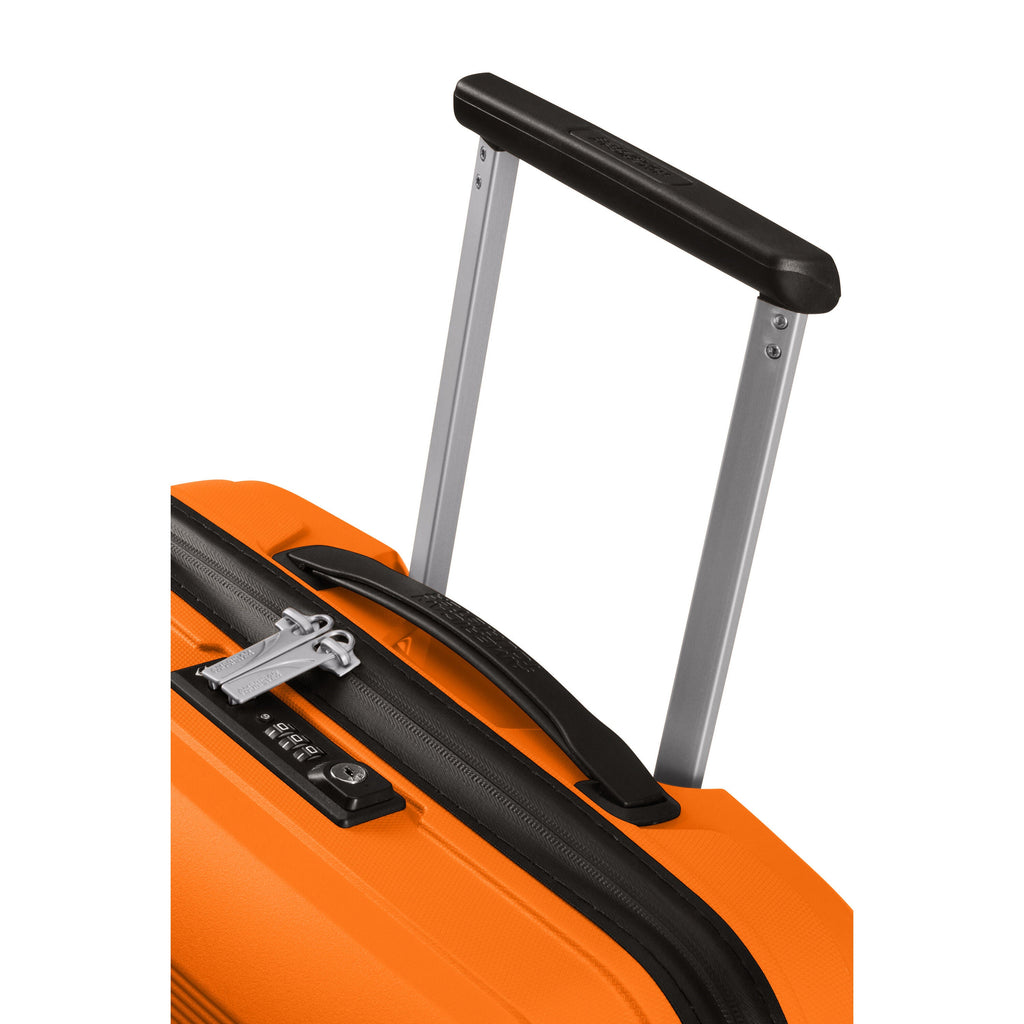 American Tourister Airconic Spinner Carry-On™ in the color Mango Orange.