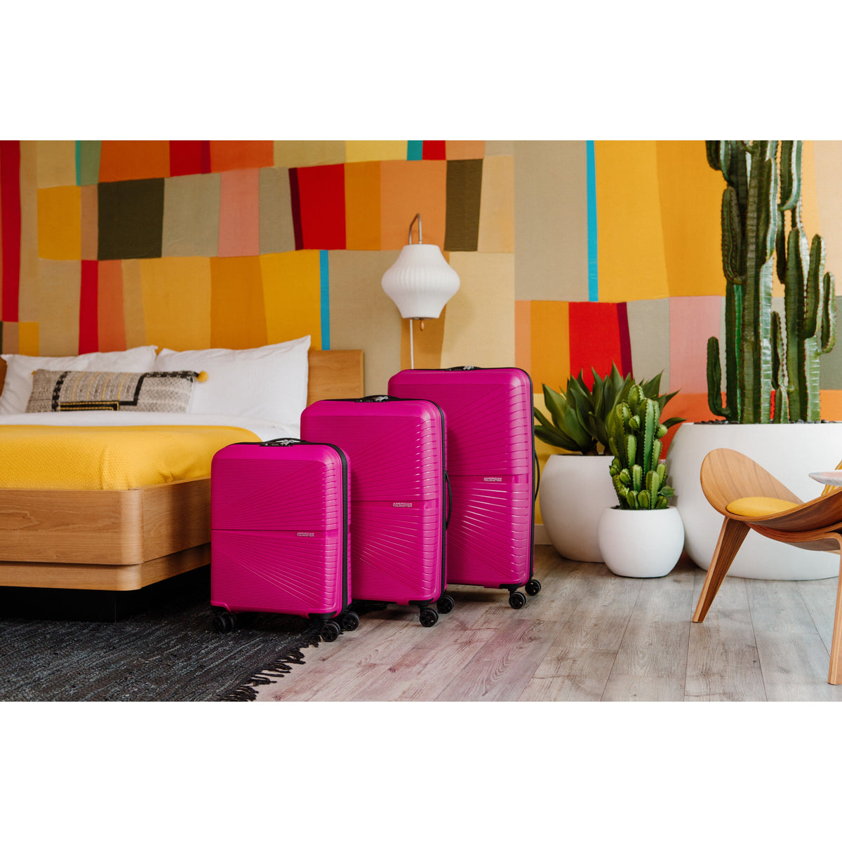 American Tourister Airconic Spinner Carry-On™ in the color Deep Orchid.