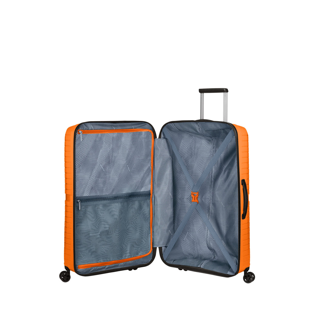 American Tourister Airconic Spinner Large in the color Mango Orange.