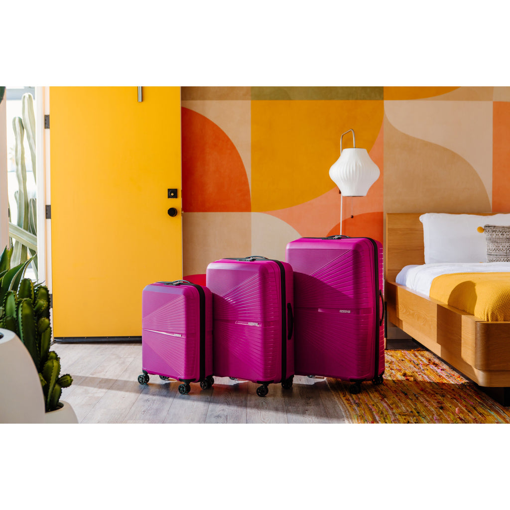 American Tourister Airconic Spinner Large in the color Deep Orchid.