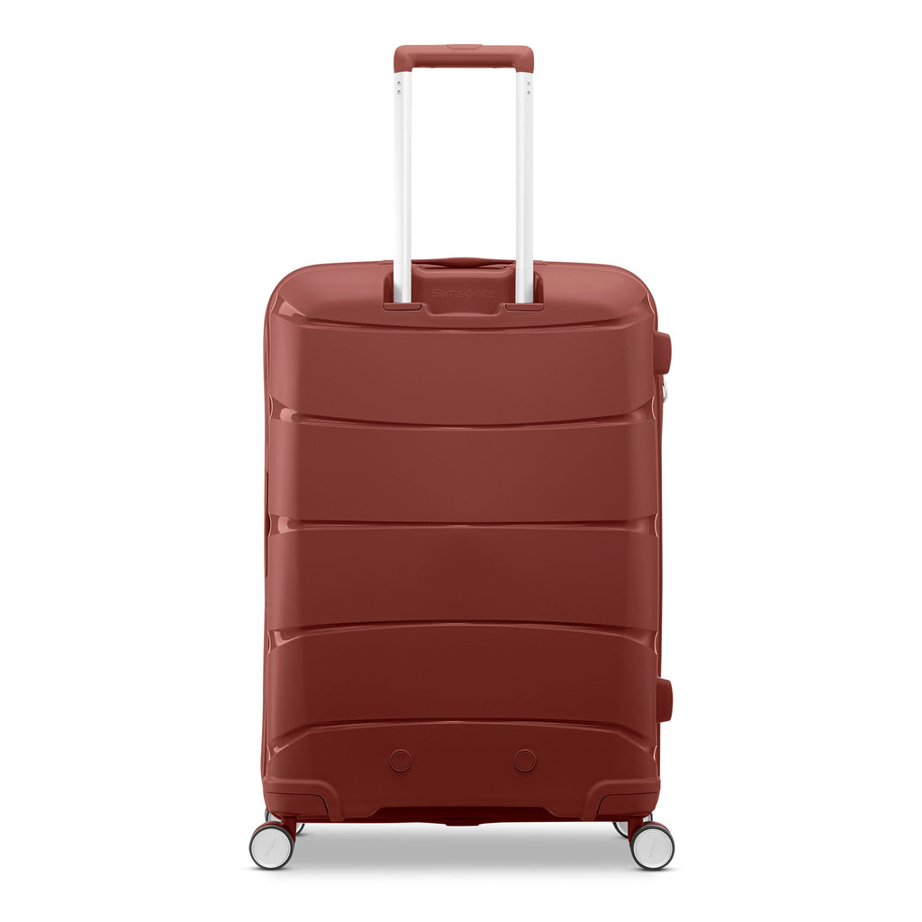 Samsonite Outline Pro Spinner Medium in the color Mars Red.