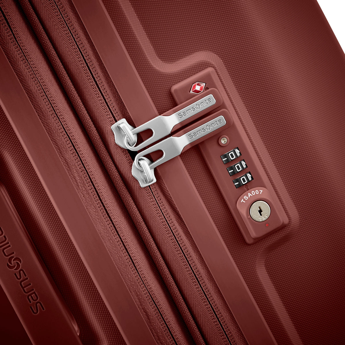 Samsonite Outline Pro Spinner Medium in the color Mars Red.