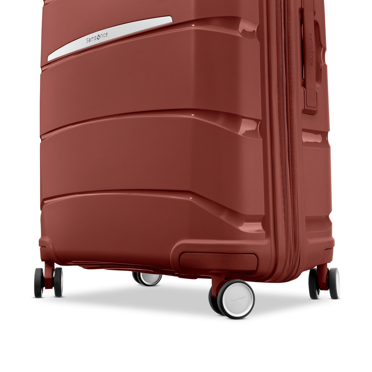 Samsonite Outline Pro Spinner Medium in the color Mars Red.