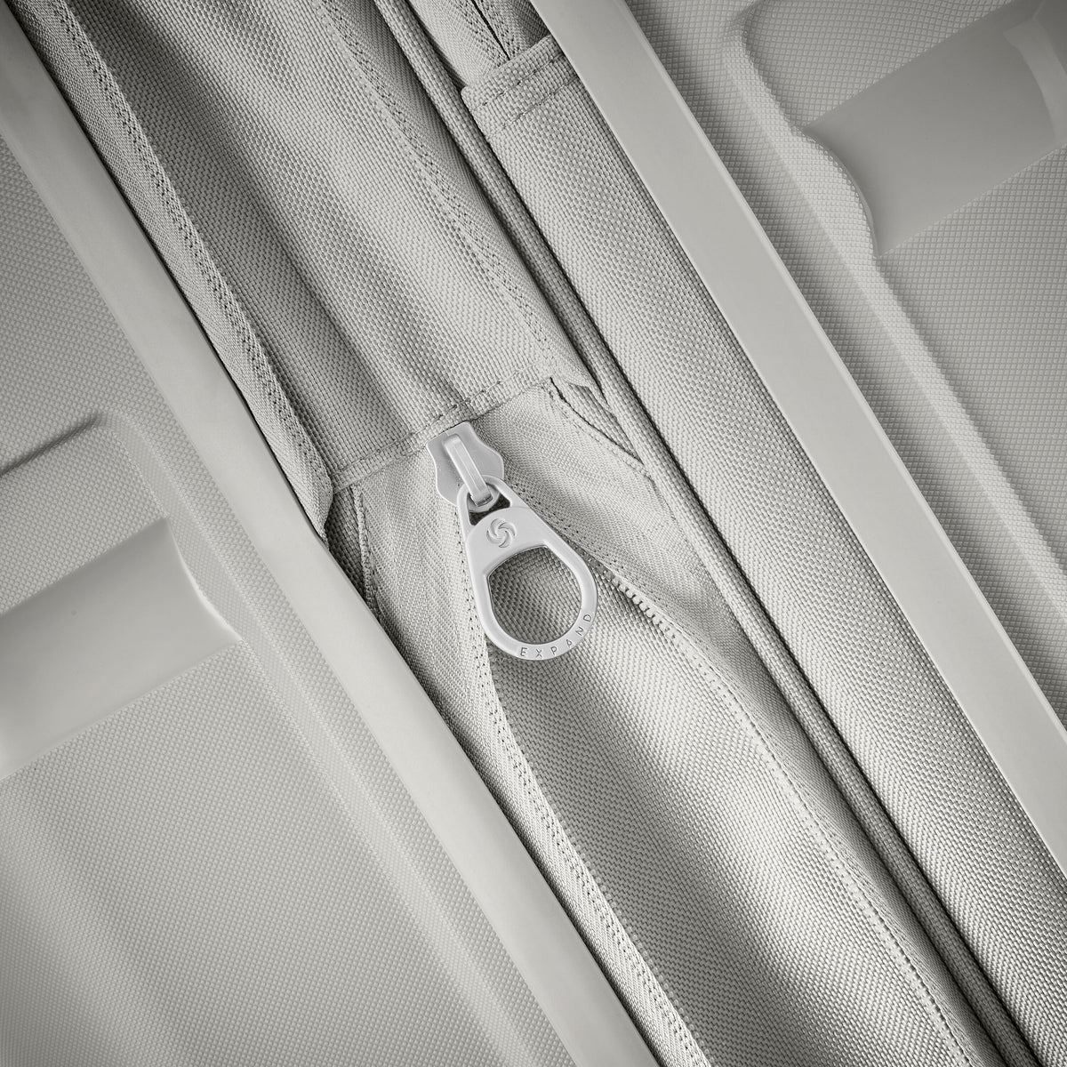 Samsonite Outline Pro Spinner Medium in the color Stone Grey.