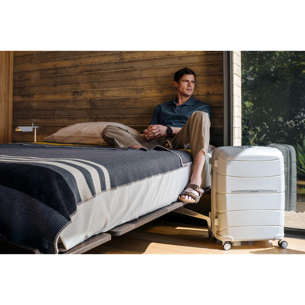 Samsonite Outline Pro Spinner Medium in the color Stone Grey.