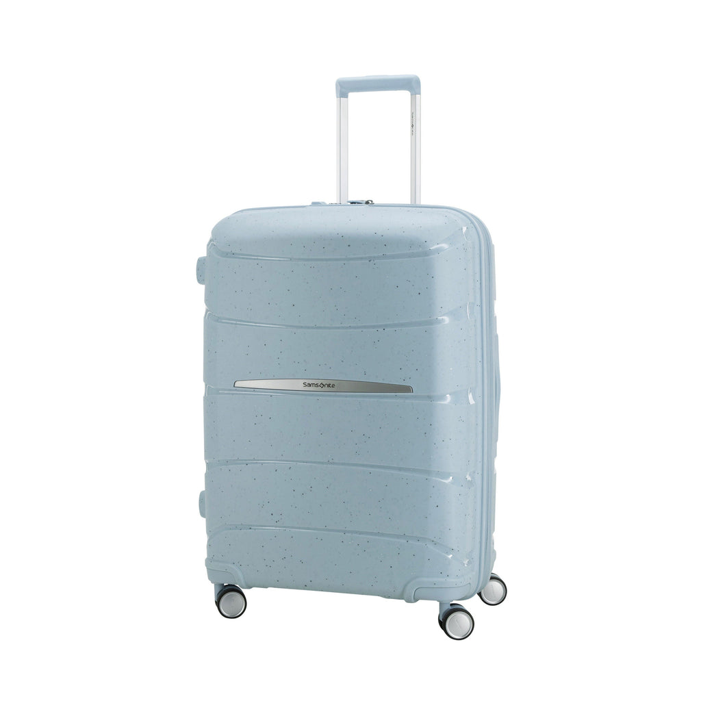 Samsonite Outline Pro Spinner Medium in the color Translucent Blue.