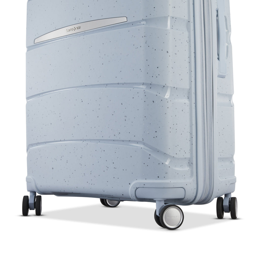 Samsonite Outline Pro Spinner Medium in the color Translucent Blue.
