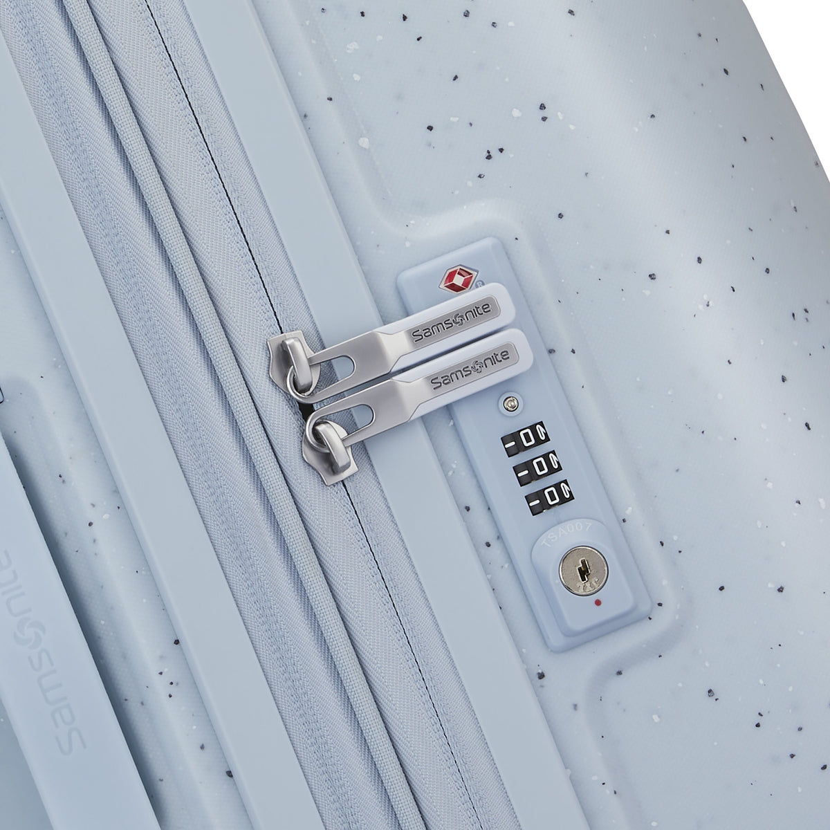 Samsonite Outline Pro Spinner Medium in the color Translucent Blue.