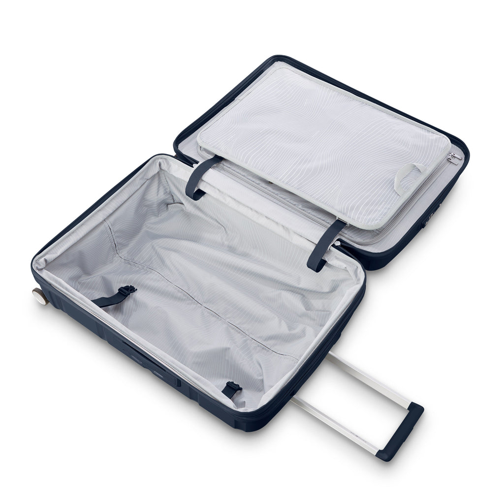 Samsonite Outline Pro Spinner Large in the color Midnight Blue.
