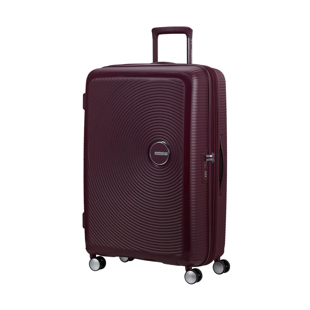 American Tourister Curio Spinner Large in the color Wild Cherry.