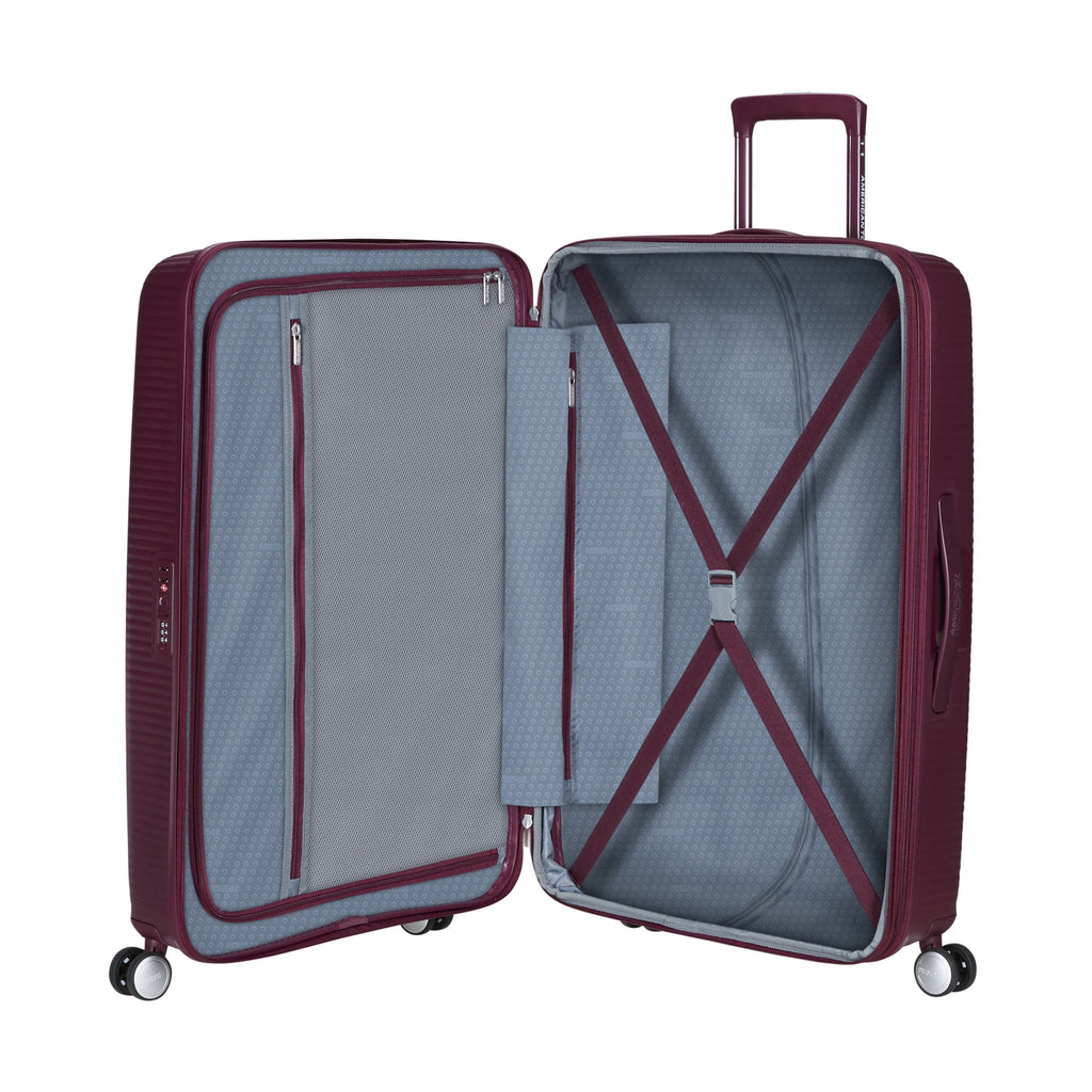 American Tourister Curio Spinner Large in the color Wild Cherry.