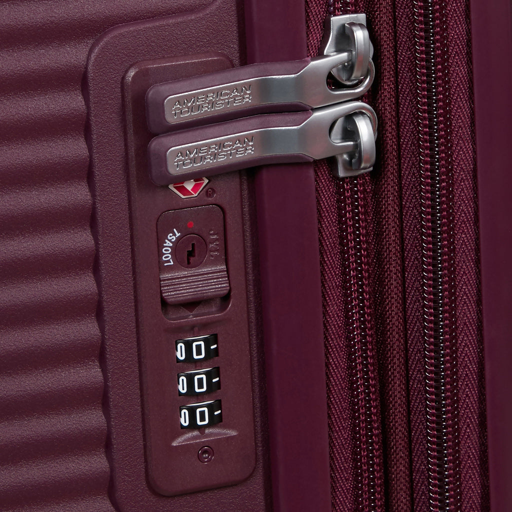 American Tourister Curio Spinner Large in the color Wild Cherry.