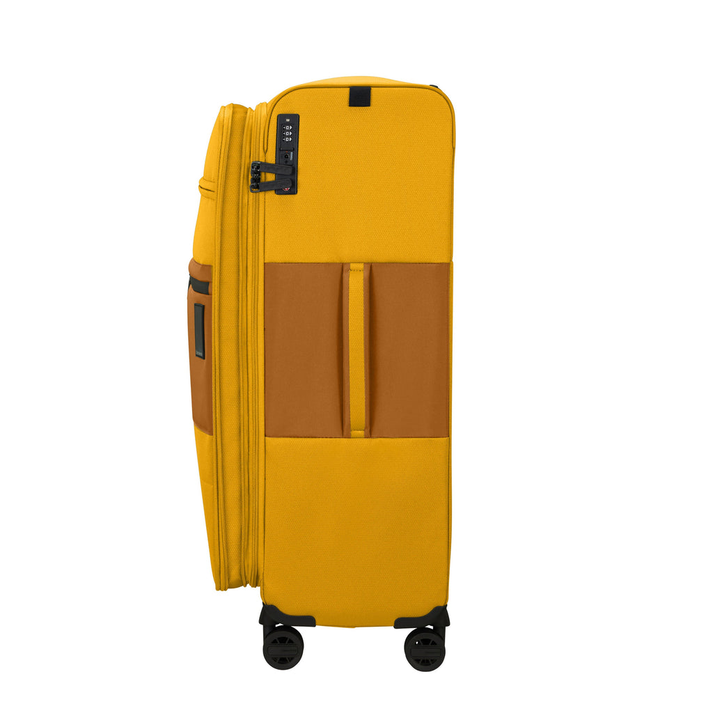 Samsonite Vaycay Spinner Large in the color Golden Yellow.