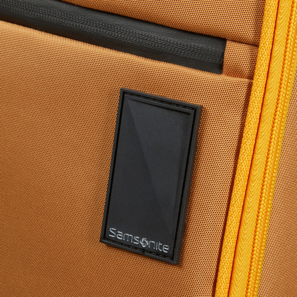 Samsonite Vaycay Spinner Large in the color Golden Yellow.