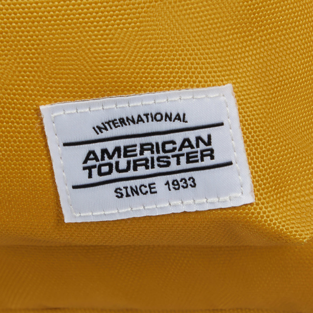 American Tourister BrightUp Backpack in the color Yellow.