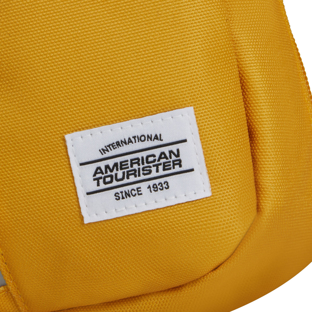 American Tourister BrightUp Sling Bag in the color Yellow.