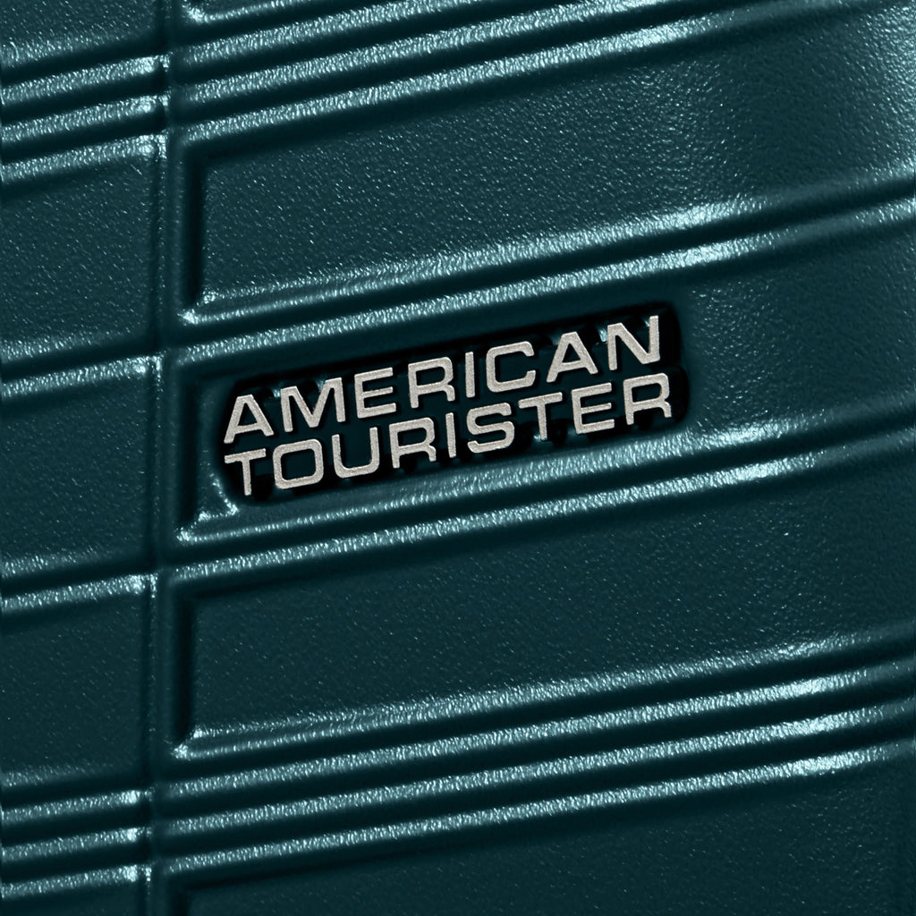 American Tourister Surftime Spinner Large in the color Metallic Teal.