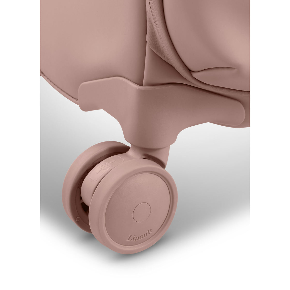 Lipault Lost In Berlin Cabin Spinner 2.0 in the color Rose Quartz.