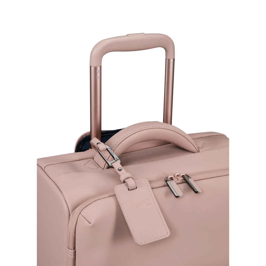 Lipault Lost In Berlin Cabin Spinner 2.0 in the color Rose Quartz.
