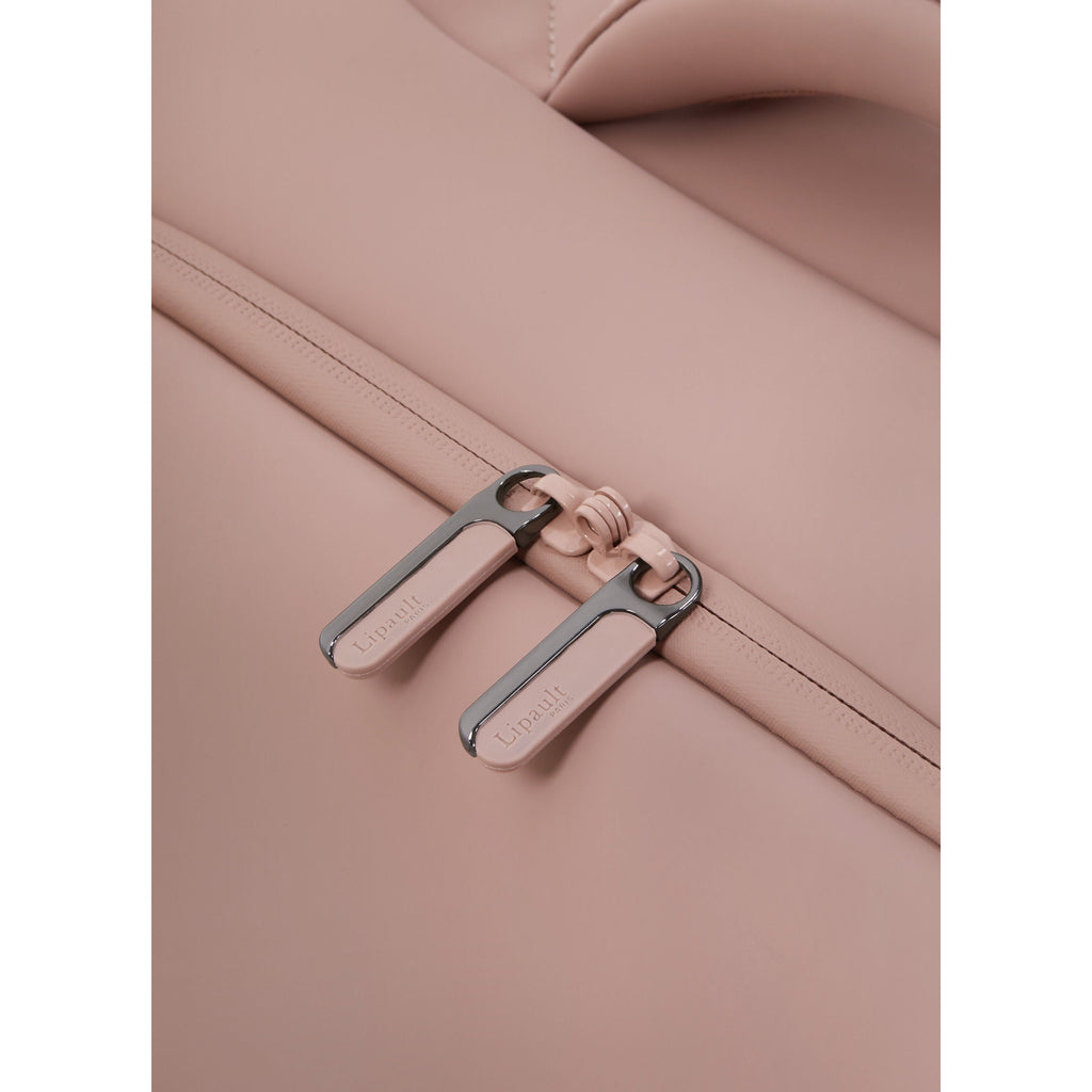 Lipault Lost In Berlin Cabin Spinner 2.0 in the color Rose Quartz.