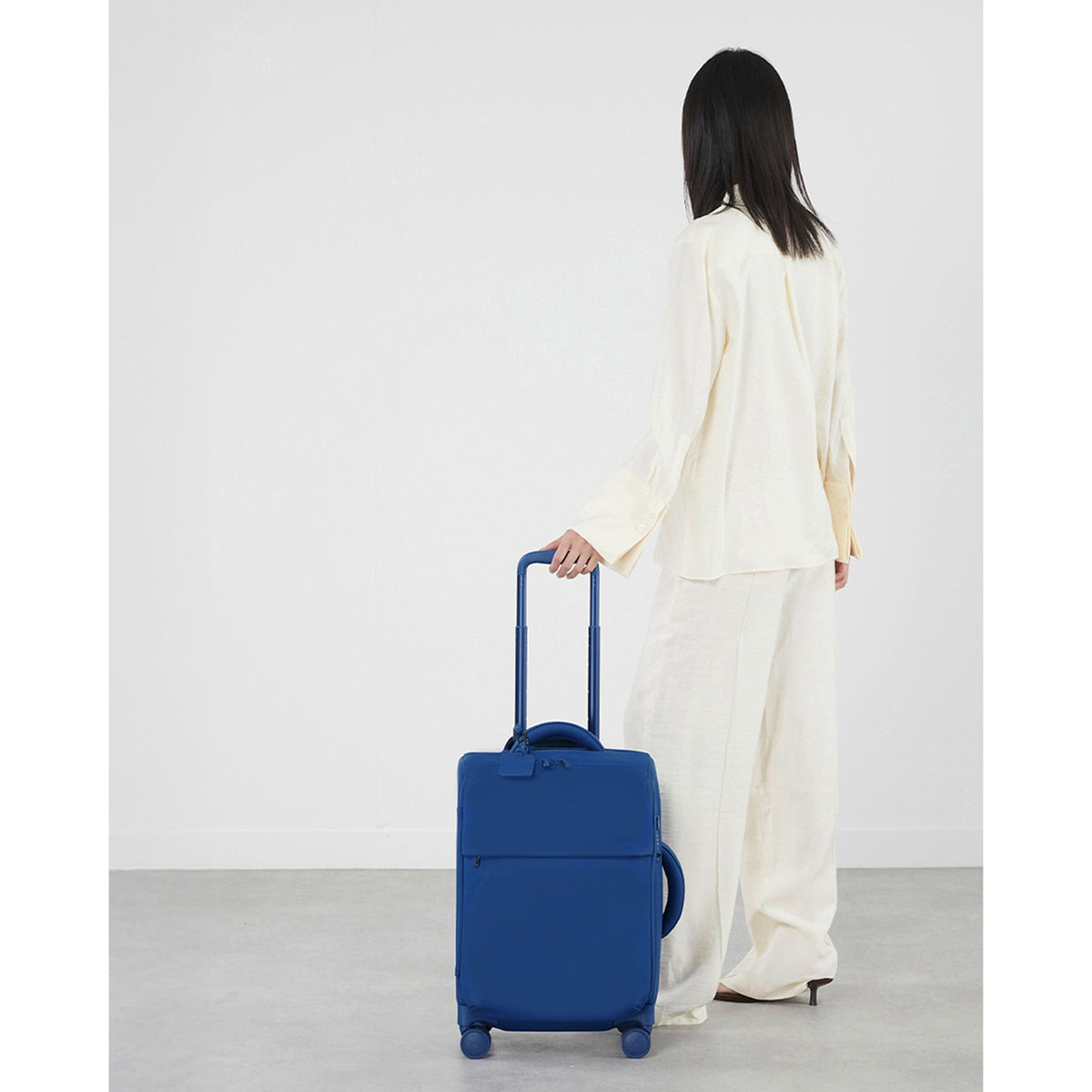 Lipault Lost In Berlin Cabin Spinner 2.0 in the color Blue Me Away.