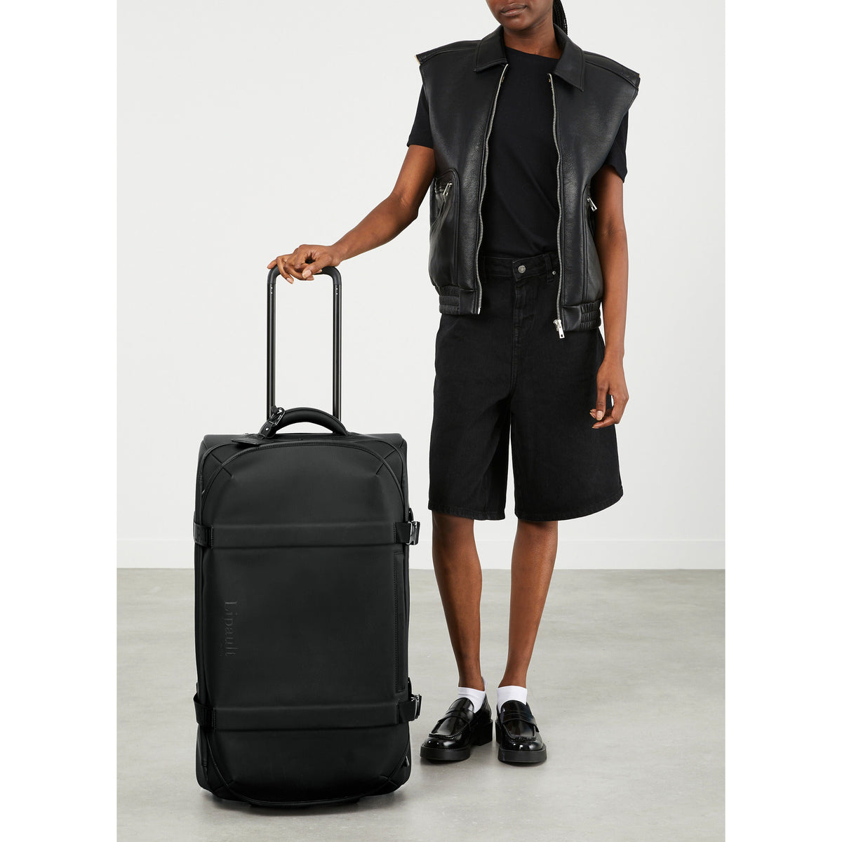 Lipault LOST IN BERLIN Wheeled Duffle in the color Black.