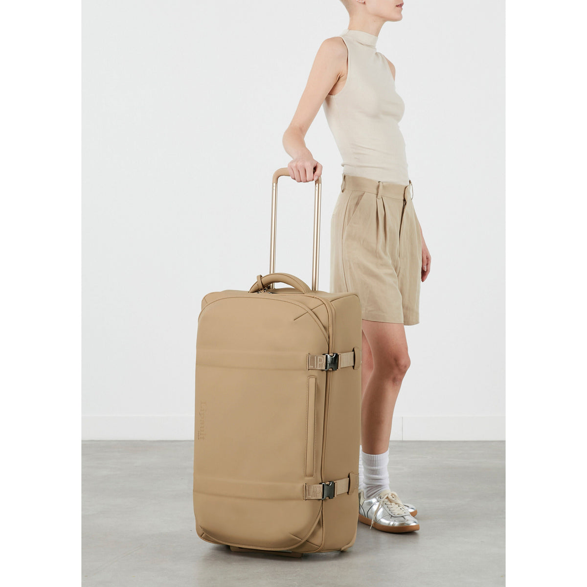 Lipault LOST IN BERLIN Wheeled Duffle in the color Sandstone.