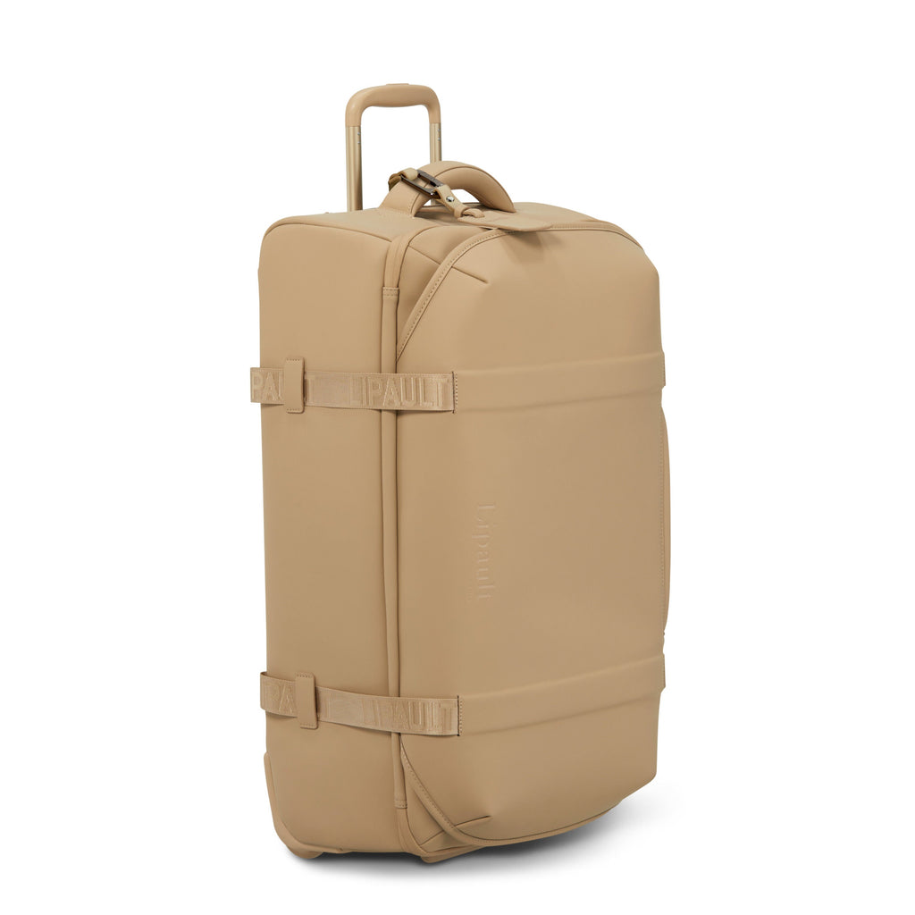 Lipault LOST IN BERLIN Wheeled Duffle in the color Sandstone.