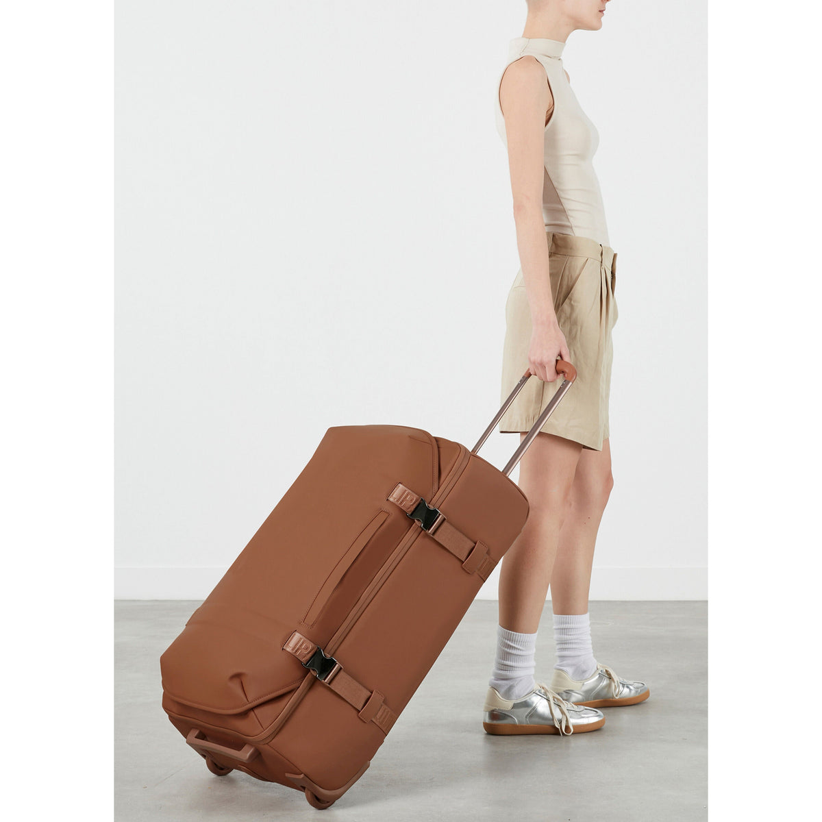 Lipault LOST IN BERLIN Wheeled Duffle in the color Nutsy Nut.