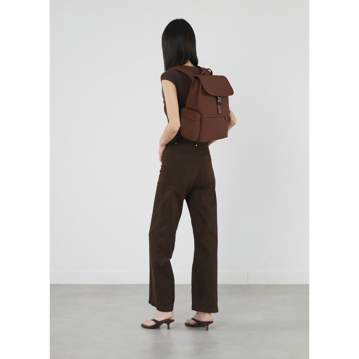 Lipault LOST IN BERLIN Mini Cargo Backpack in the color Spiced Mocha.