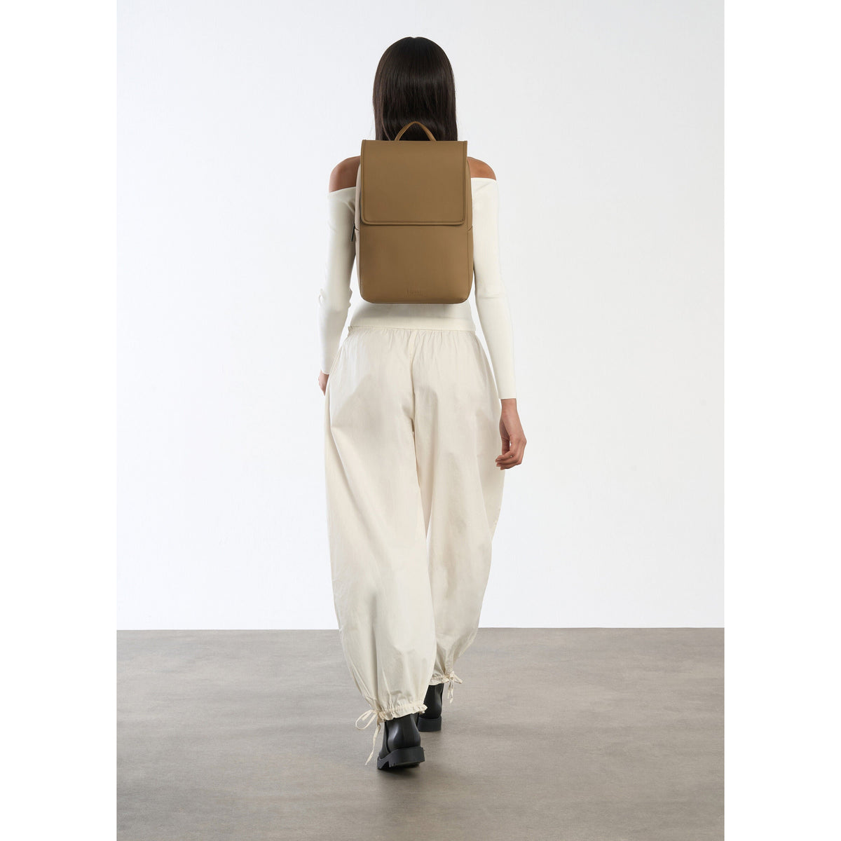 Lipault Lost In Berlin Square Backpack 2.0 in the color Golden Mud.