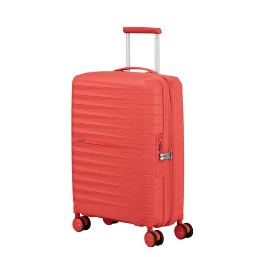 American Tourister FastForward Spinner Carry-On™ in the color Sunset Coral.