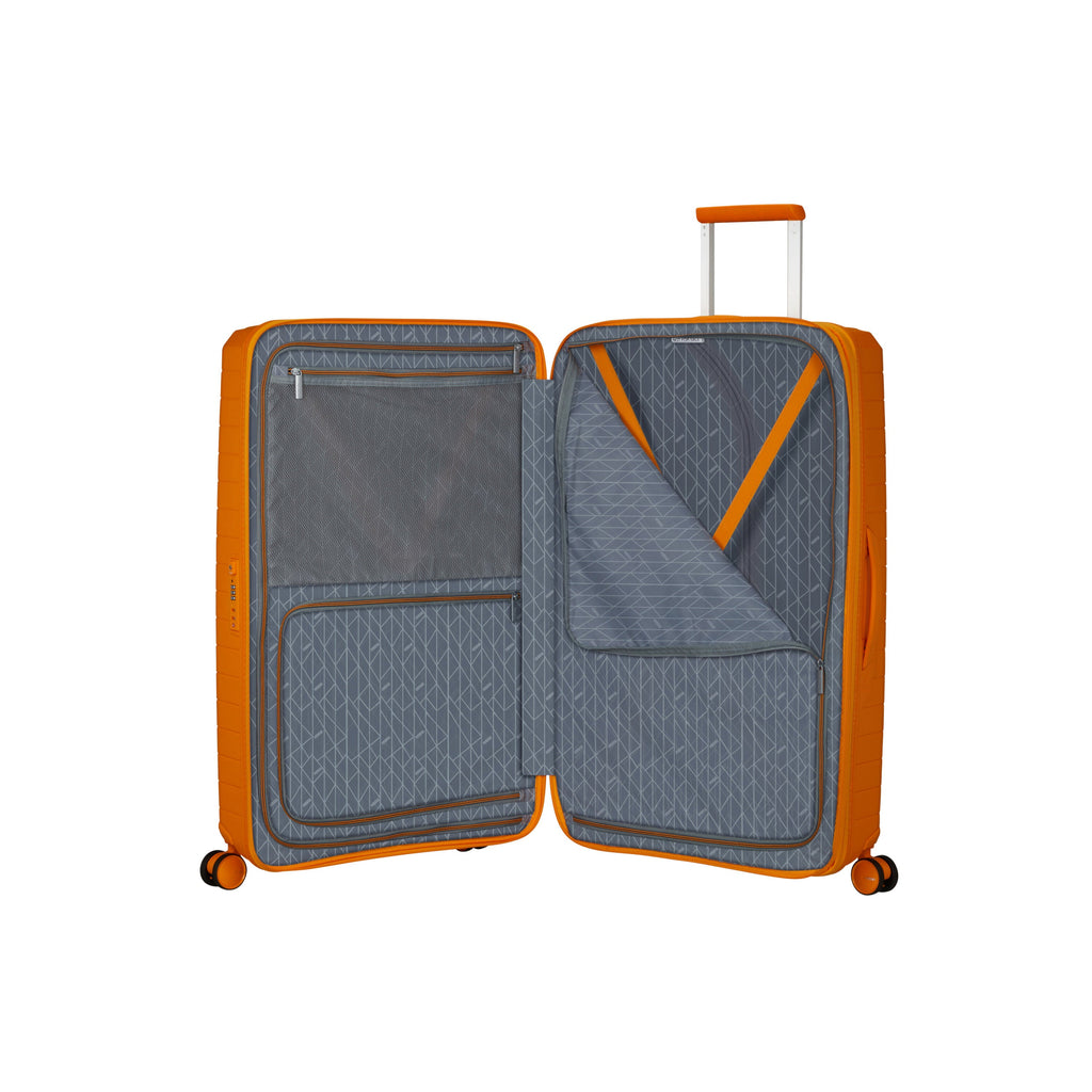 American Tourister FastForward Spinner Large in the color Radiant Orange.