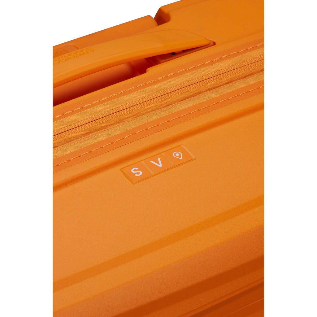 American Tourister FastForward Spinner Large in the color Radiant Orange.