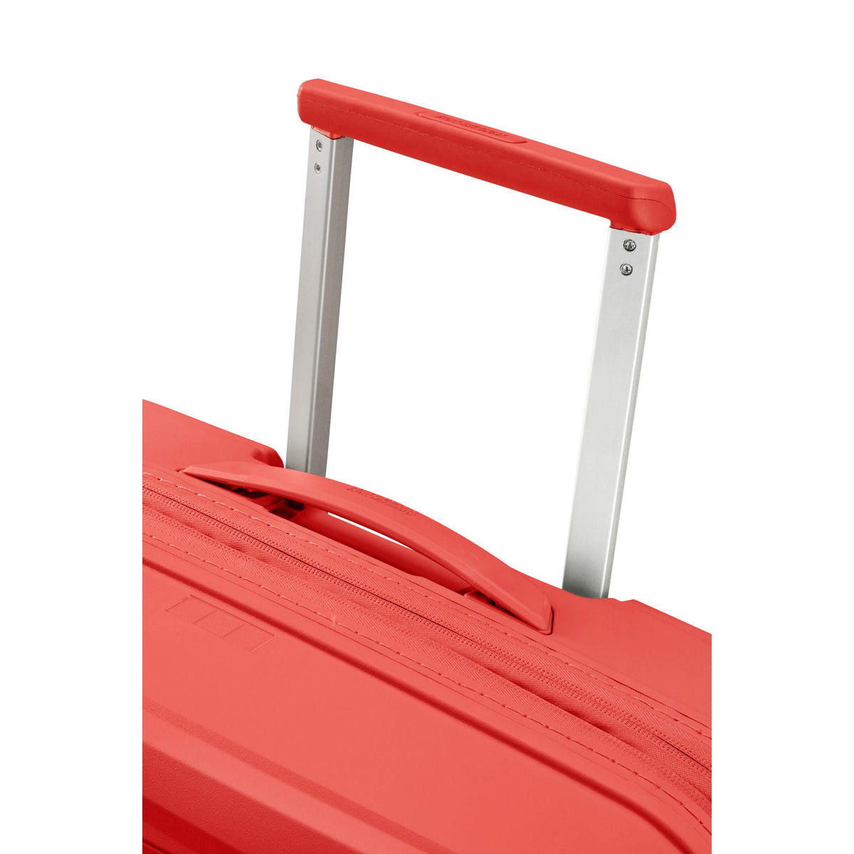 American Tourister FastForward Spinner Large in the color Sunset Coral.