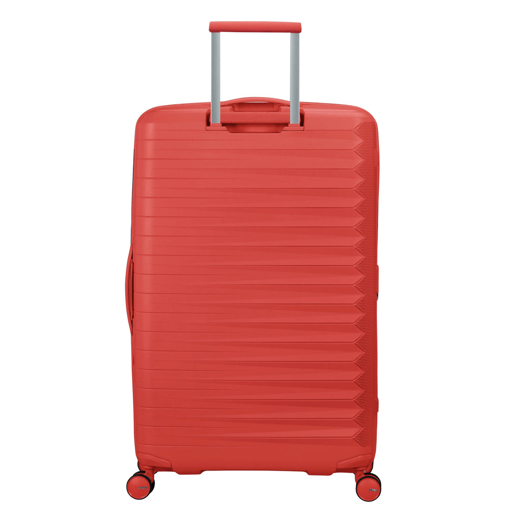 American Tourister FastForward Spinner Large in the color Sunset Coral.