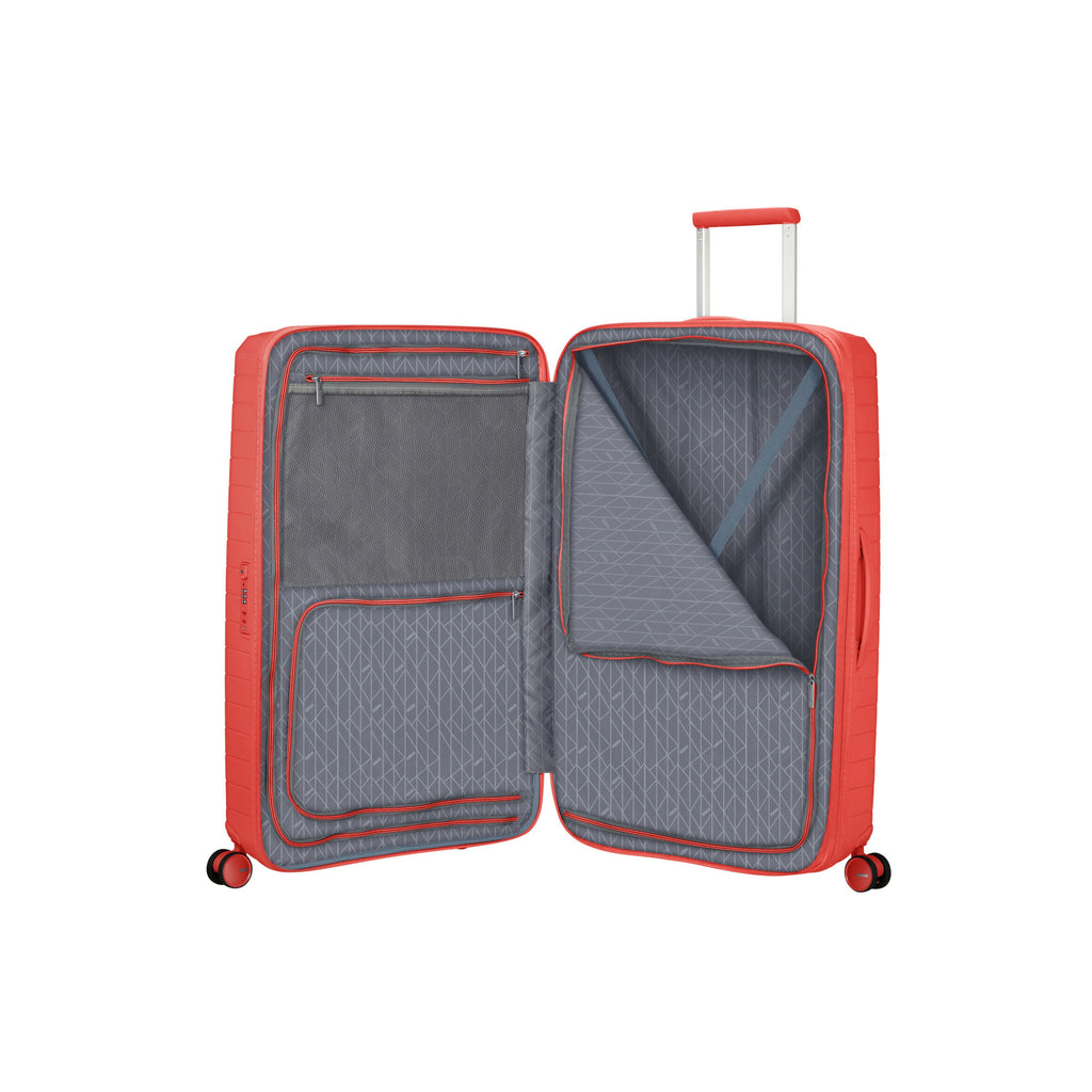 American Tourister FastForward Spinner Large in the color Sunset Coral.