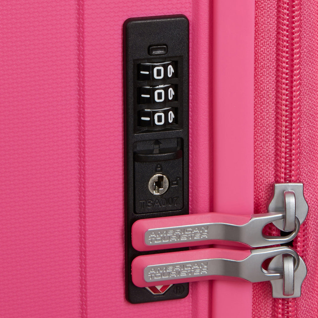 American Tourister Rejoy Spinner Medium in the color Hawaiian Pink.
