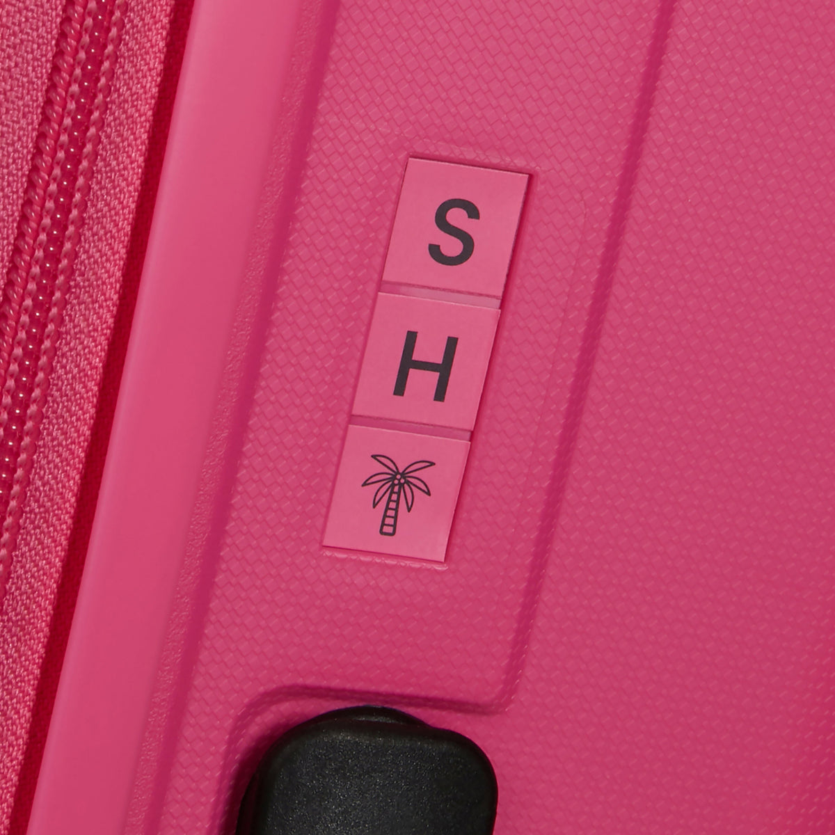American Tourister Rejoy Spinner Large in the color Hawaiian Pink.