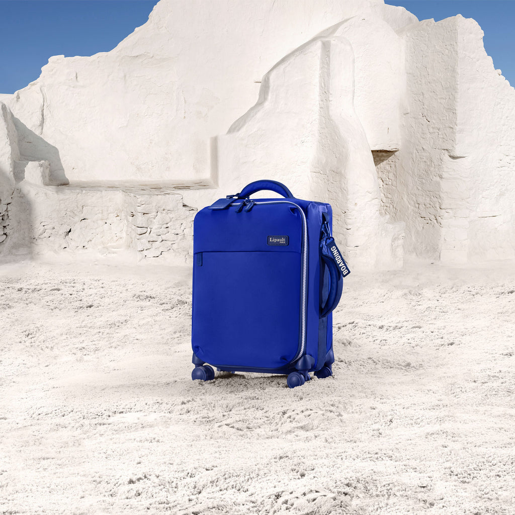 Lipault Plume Cabin Spinner - Layover in Mykonos in the color Magnetic Blue.