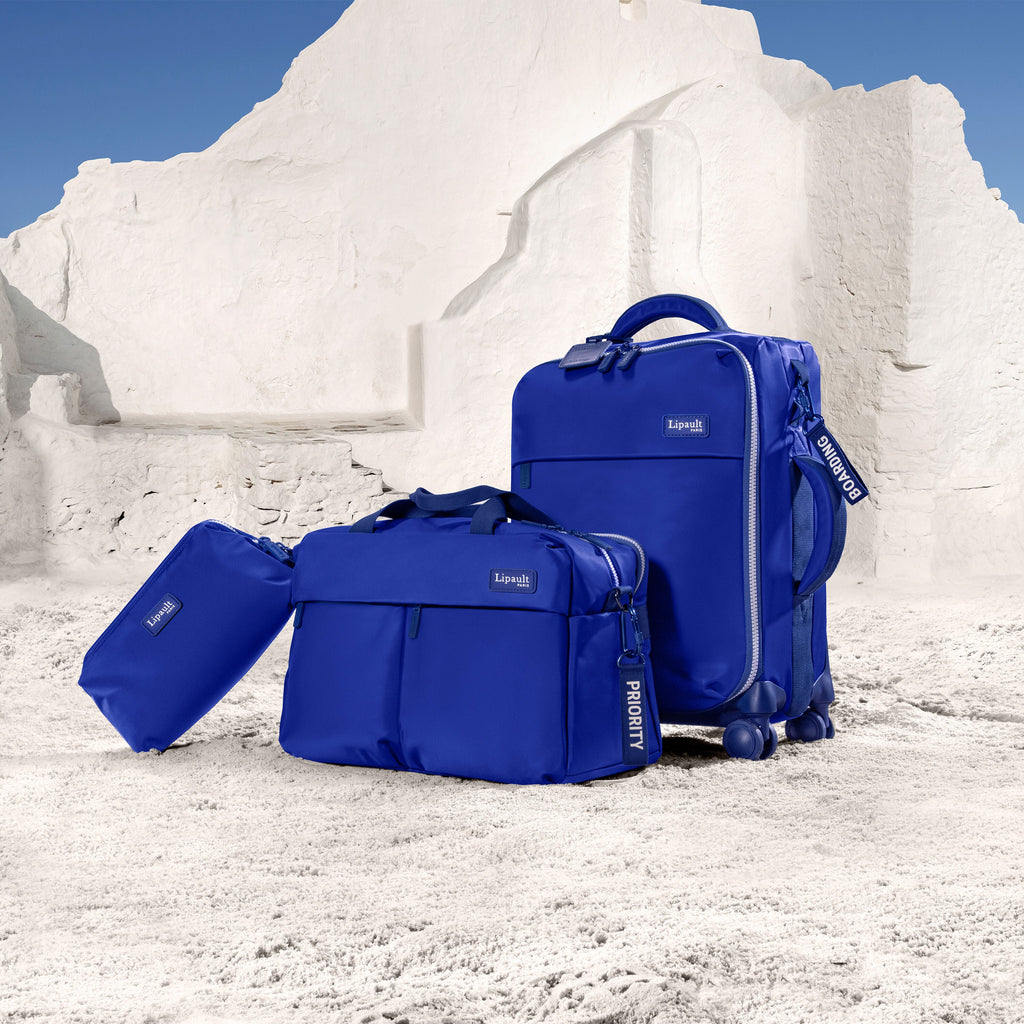 Lipault Plume Cabin Spinner - Layover in Mykonos in the color Magnetic Blue.
