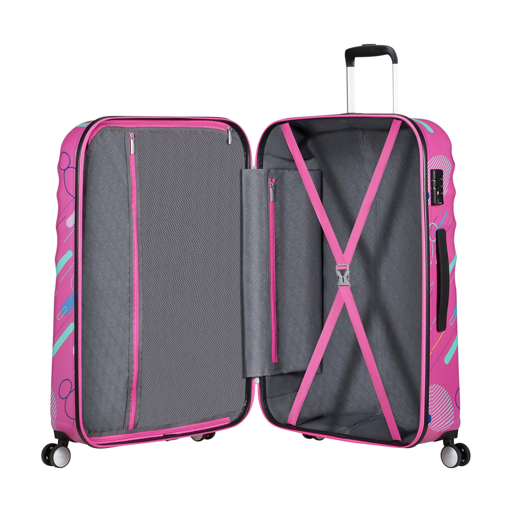 American Tourister Disney Wavebreaker Spinner Large in the color Minnie Future Pop.