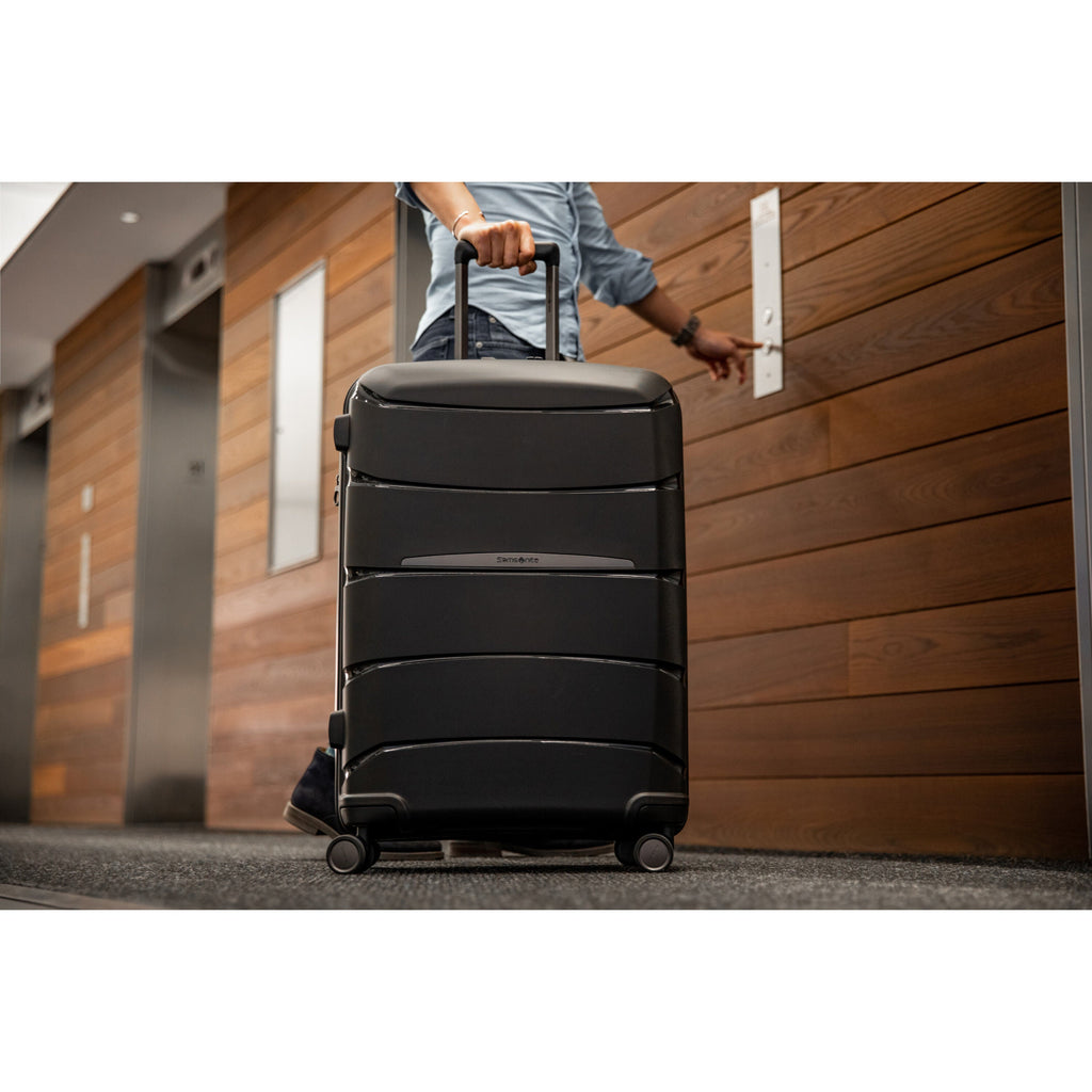 Samsonite Outline Pro Spinner Large in the color Midnight Black.