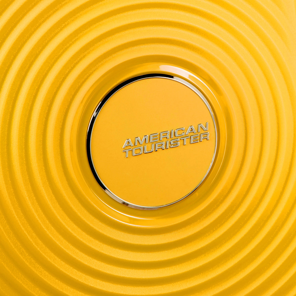 American Tourister Curio Spinner Medium in the color Golden Yellow.