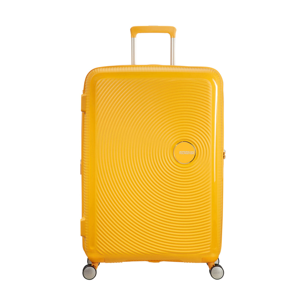American Tourister Curio Spinner Large in the color Golden Yellow.