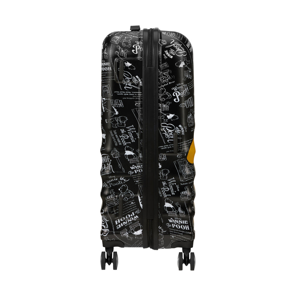 American Tourister Disney Wavebreaker Spinner Medium in the color Winnie The Pooh.