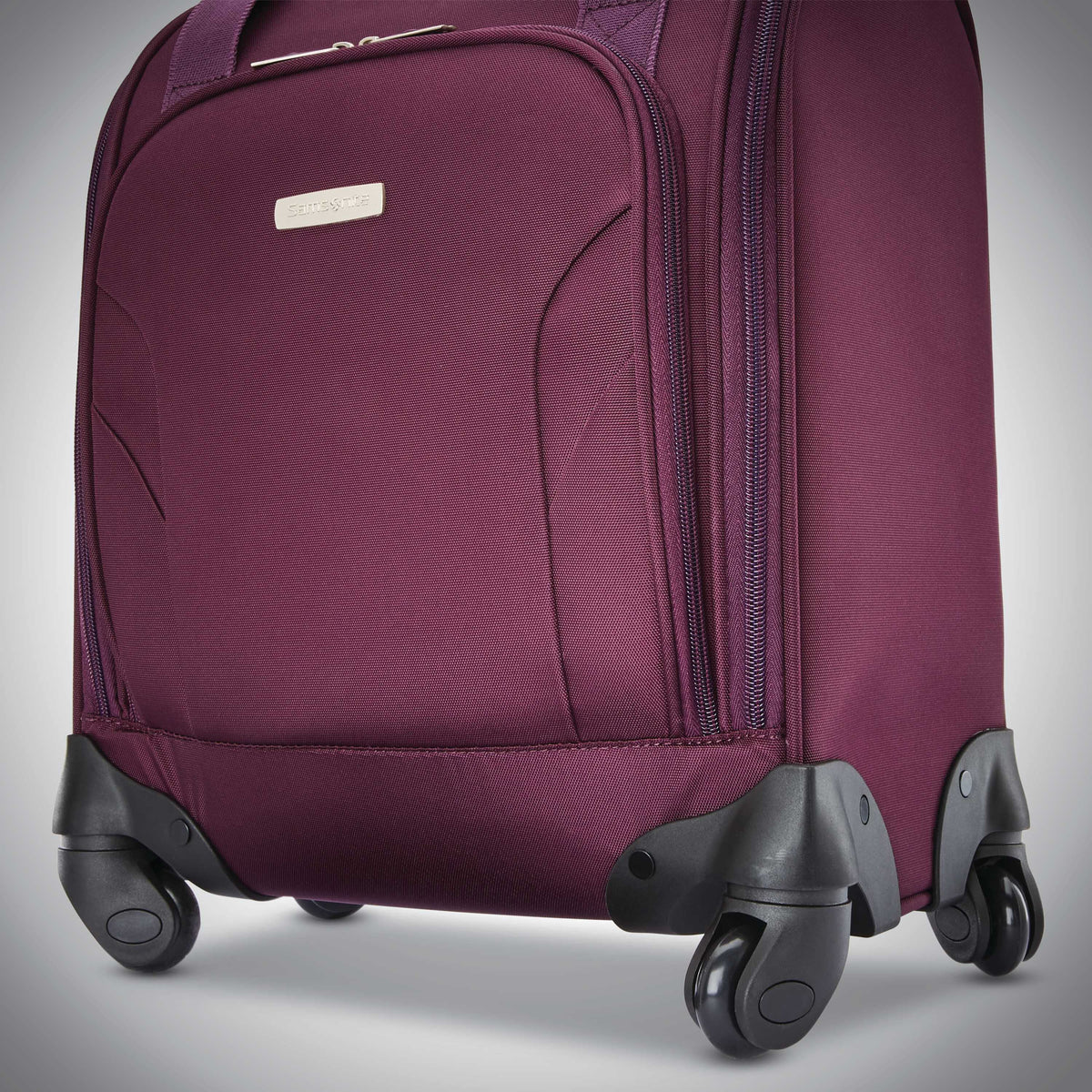 Samsonite Spinner Underseater w/ USB Port in the color Purple.